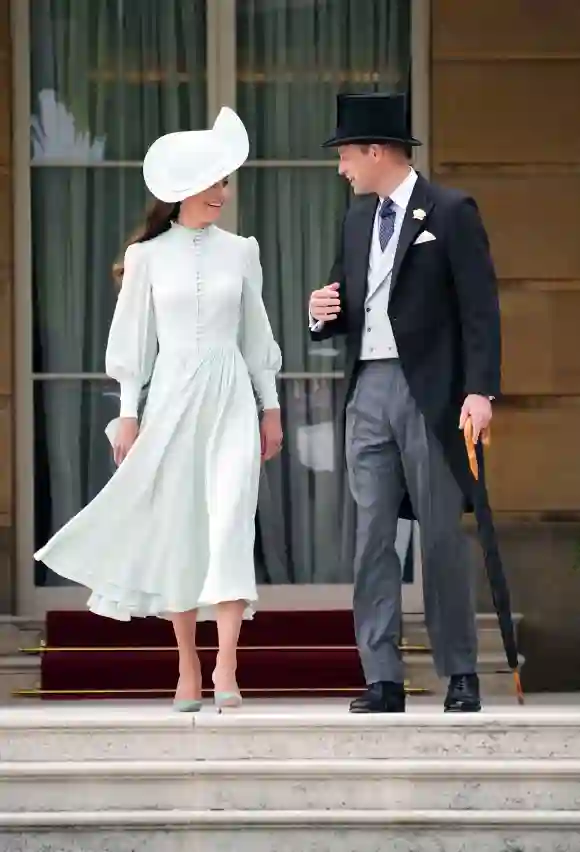 Prince William Kate Middleton royal garden party Buckingham Palace rain hats photos pictures 2022 Prince Edward Sophie Wessex