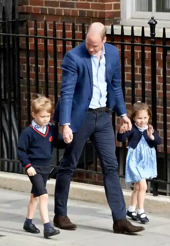 Prince William, Duke of Cambridge, arrives at the Lindo Wing with Prince George and Princess Charlotte after Catherine, Duchess of Cambridge, gives birth to their son at St Mary's Hospital.