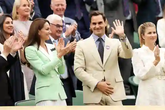 LONDON, ENGLAND - JULY 04: Former Wimbledon Champion, Roger Federer of Switzerland interacts with Catherine, Princess of Wales as he is honoured in the Royal Box prior to the Women's Singles first round match between Shelby Rogers of United States and Elena Rybakina of Kazakhstan during day two of The Championships Wimbledon 2023 at All England Lawn Tennis and Croquet Club on July 04, 2023 in London, England. (Photo by Clive Brunskill/Getty Images)