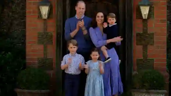 Prince William, Duchess Kate, Prince George, Princess Charlotte and Prince Louis applaud the nursing staff.