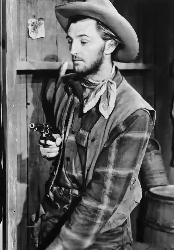 Robert Mitchum as "Rigney" in Hoppy Serves a Writ (1943).
