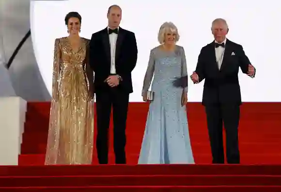 The Royals Hit The Red Carpet At No Time To Die world Premiere event Prince WIlliam and Kate Charles Camilla film movie Daniel Craig pictures photos Royal Family news suit dress tuxed