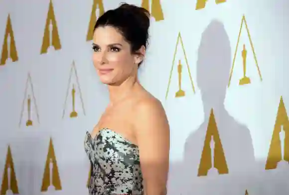 Sandra Bullock poses on arrival for the 86th Oscar's Nominee's Luncheon.