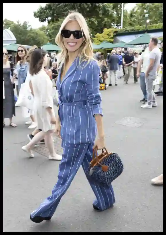. 09/07/2023. London, United Kingdom. Sienna Miller on day seven of the Wimbledon Tennis Championships in London. PUBLIC