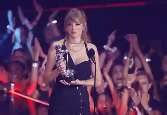 Taylor Swift holds one of her 9 awards at the 2023 MTV Video Music Awards VMA s at the Prudential Center in Newark, New