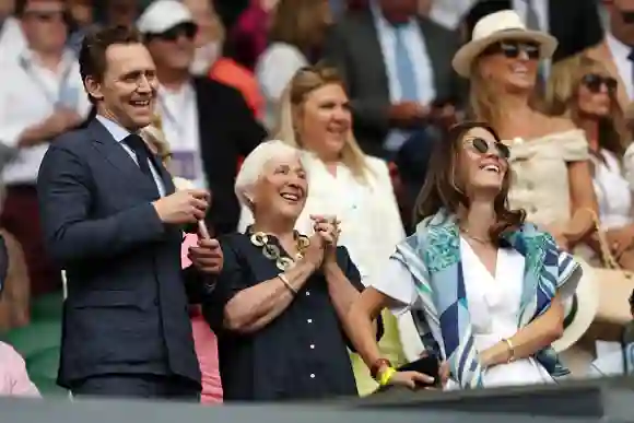 English actor Thomas William Hiddleston (L) reacts to Serbia's Novak Djokovic's win over Poland's Hubert Hurkacz during their men's singles tennis match on the eighth day of the 2023 Wimbledon Championships at The All England Tennis Club in Wimbledon, southwest London, on July 10, 2023. (Photo by Adrian DENNIS / AFP) / RESTRICTED TO EDITORIAL USE (Photo by ADRIAN DENNIS/AFP via Getty Images)