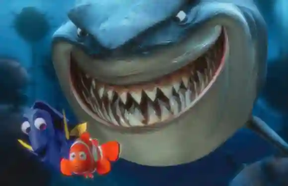 "Dory" and "Marlin" are chased by a shark