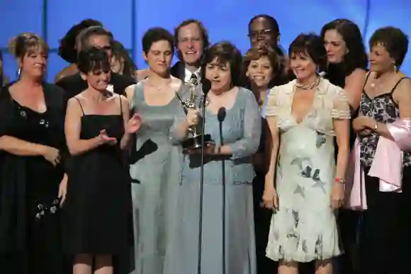 The cast of 'As The World Turns' receiving a Daytime Emmy.