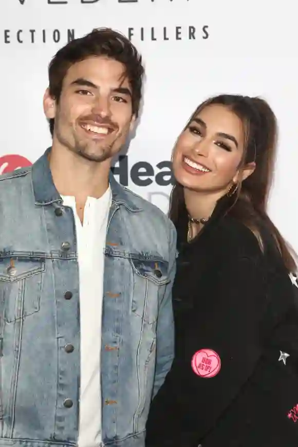 Ashley Iaconetti and Jared Haibon attend a red carpet event in 2019.