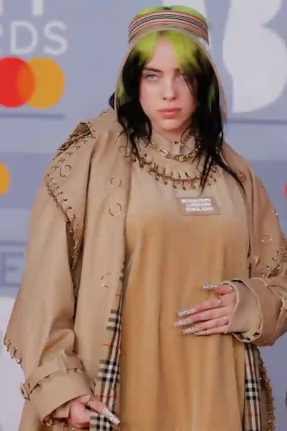 Billie Eilish poses on the red carpet on arrival for the BRIT Awards 2020 in London on February 18, 2020.