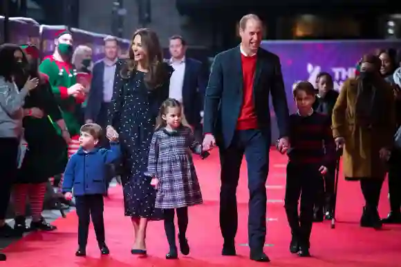 Prince William, Duchess Kate, and their children Prince George, Princess Charlotte, and Prince Louis attend a special pantomime performance of The National Lotterys Pantoland, December 11, 2020.