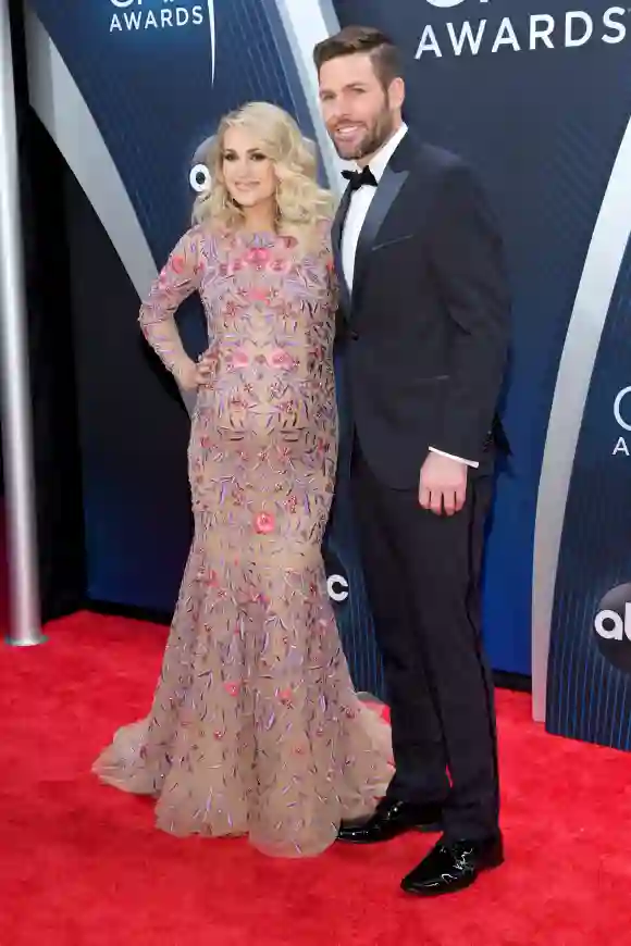 Carrie Underwood and Mike Fisher attend the 52nd annual CMA Awards, November 14, 2018.