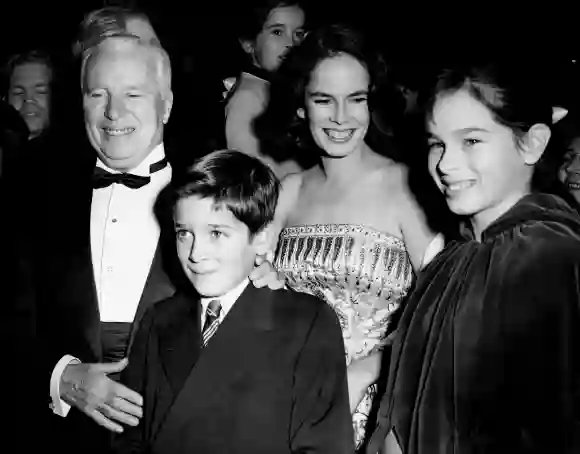 Charlie Chaplin with his wife Ooana and children Michael and Geraldine