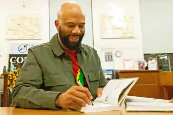 Syndication: Wilmington News Journal Common, rapper, actor, writer and activist, signs his book And Then We Rise: A Guid