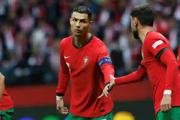October 12, 2024, Warsaw, Poland: Cristiano Ronaldo, Bruno Fernandes (Portugal) seen in action during UEFA Nations Leagu