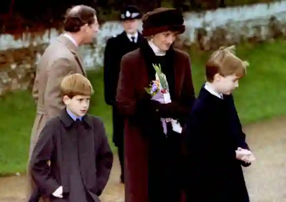 Princess Diana and sons, William and Harry, leave the church of St. Mary Magdalen near Sandrigham House 25 December.