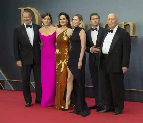 The cast of the Downton Abbey movie on the red carpet with Julian Fellowes.