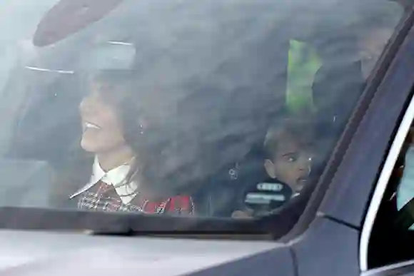 Duchess Catherine and Prince Louis leave the Christmas Lunch at Buckingham Palace.