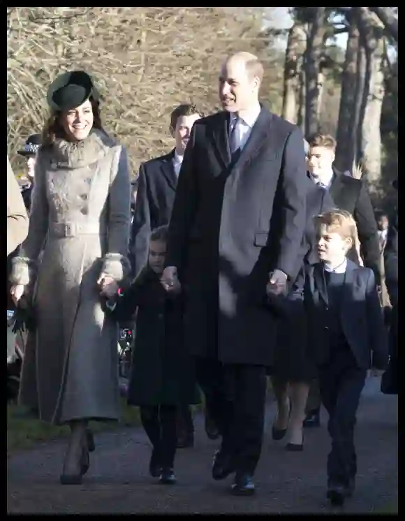 Duchess Catherine, Princess Charlotte, Prince William and Prince George on their way to Christmas Day service.