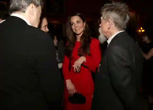 Catherine, Duchess of Cambridge meets actor John Hurt during the Dramatic Arts reception, February 17, 2014.