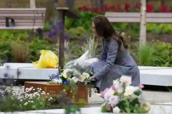 Catherine, Duchess of Cambridge lays flowers at the official opening of the Glade of Light memorial, May 10, 2022.