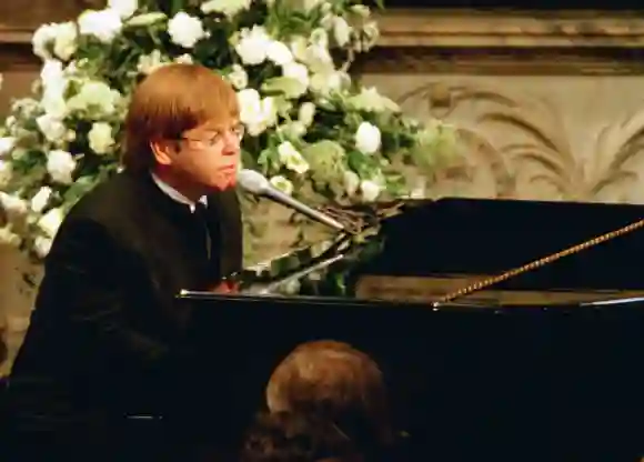 Elton John performs "Candle In The Wind" at Lady Diana's funeral on September 6, 1997