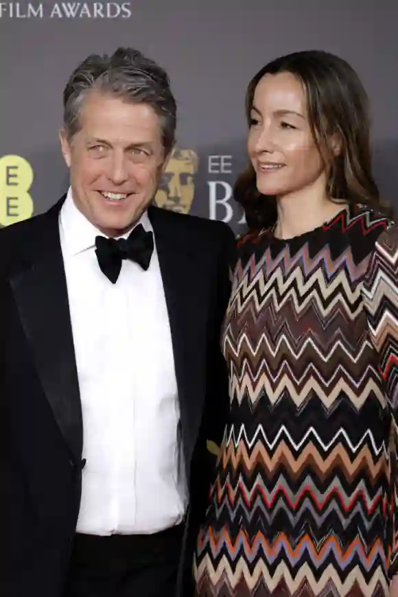 Hugh Grant and Anna Eberstein