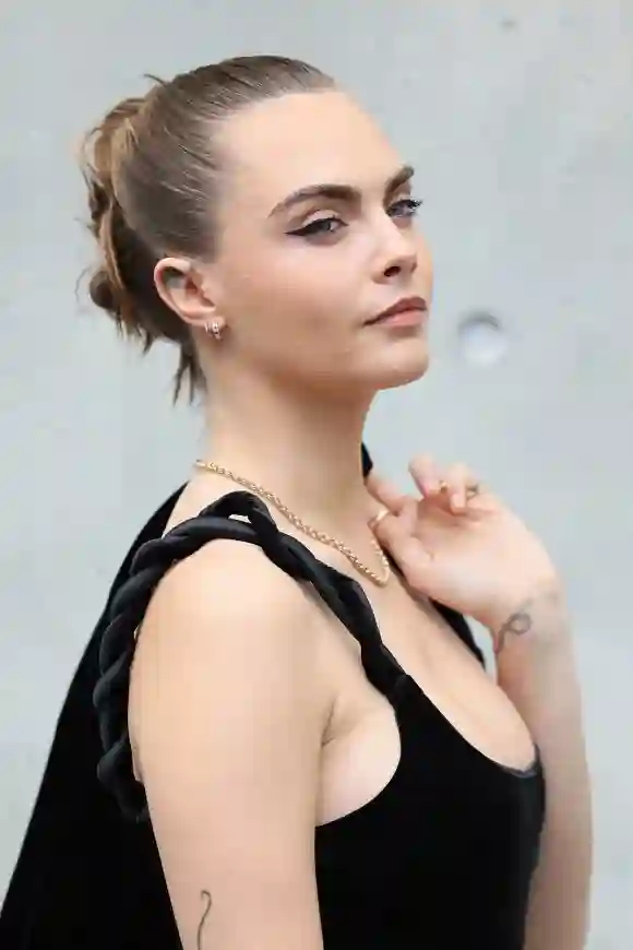 MFW - Emporio Armani Front Row Cara Delevingne attends the Emporio Armani fashion show during the Milan Fashion Week Wom