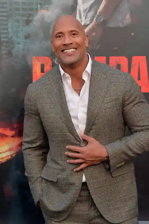 The Rock insta a cambiar el tono de piel para encerar la figura - París Foto de archivo fechada el 4 de abril de 2018 muestra a Dwayne Johnson asiste a la pr