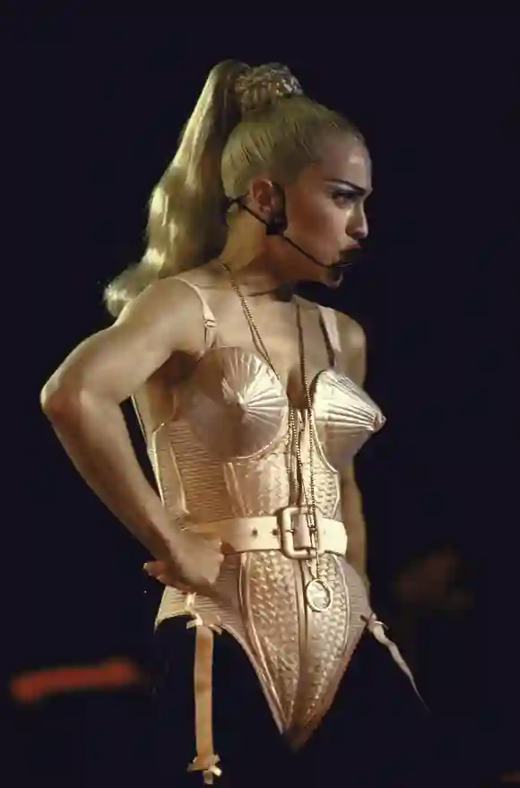 Pop  star  Madonna  wearing  conical  bustier  while  performing  onstage.DMI/The  LIFE  Picture
