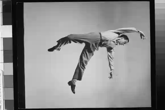 Dancer/actor  Gene  Kelly  in  series  of  dance  steps  demonstrating  influence  of  various  trai