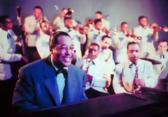 Jazz  musician  Duke  Ellington  (fore)  performing  w.  his  band.Eliot  Elisofon/The  LIFE  Pict