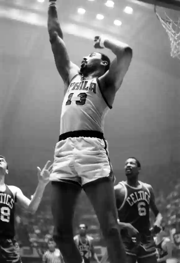 Philadelphia  76'ers,  Wilt  Chamberlain  (#13),  during  game  against  Boston  Celtics,  in  the