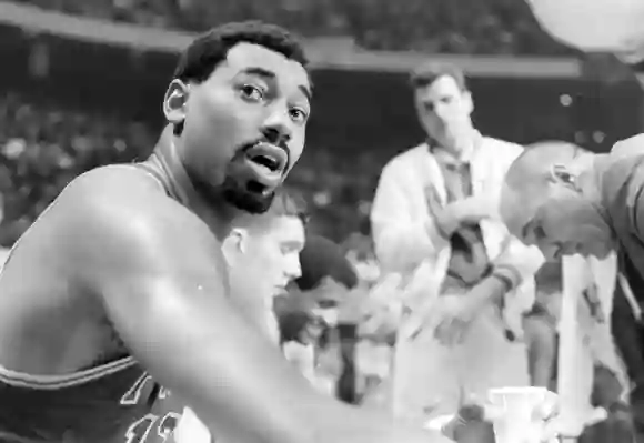 Philadelphia  76'ers,  Wilt  Chamberlain  (#13),  during  game  against  Boston  Celtics,  in  the