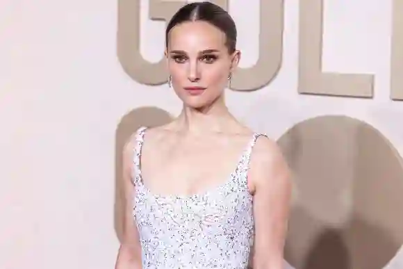 81st Annual Golden Globe Awards - LA Natalie Portman wearing a Dior Haute Couture dress and De Beers jewelry arrives at