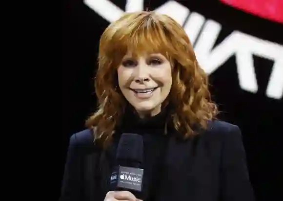 Reba McEntire speaks at the Super Bowl LVIII Pregame + Apple Music Super Bowl LVIII halftime show press conference leadi