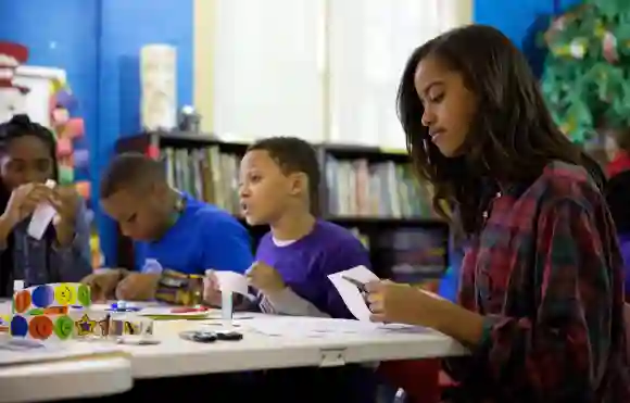 Malia Obama participates in a community service project at the Boys & Girls Club of Greater Washington, DC in celebratio