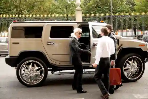 PARIS, JULY 7, 2008: Karl Lagerfeld is getting into the car Hummer in Paris, France, on July, 7, 2008.