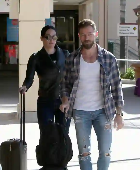 EXCLUSIVE: DWTS partners Nikki Bella and Artem Chigvintsev are spotted taking a flight out of Burbank Airport together E