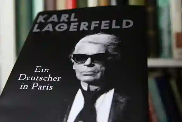 Viersen, Germany - January 2021: Close up of isolated book cover Karl Lagerfeld a german in Paris, shelf background