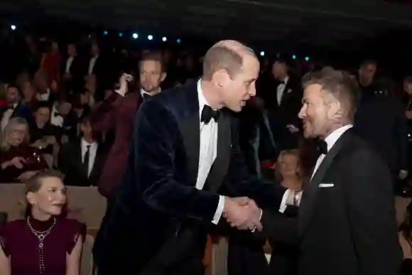 British Academy Film Awards 2024 The Prince of Wales, president of Bafta, talks with David Beckham at the Bafta Film Awa