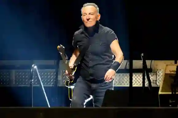 Syndication: The Record Bruce Springsteen walks onto the stage at MetLife Stadium, in East Rutherford. Wednesday, August