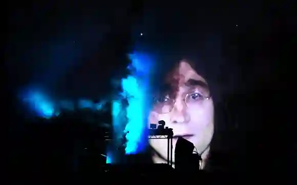 An image of John Lennon is seen as Fat Boy Slim (Normal Cook) performing at Victorious Festival, Day 1, Portsmouth. Vict