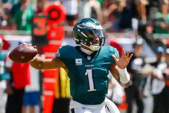 September 29, 2024, Tampa, Florida, USA: Philadelphia Eagles quarterback Jalen Hurts (1) throws a pass, while while the