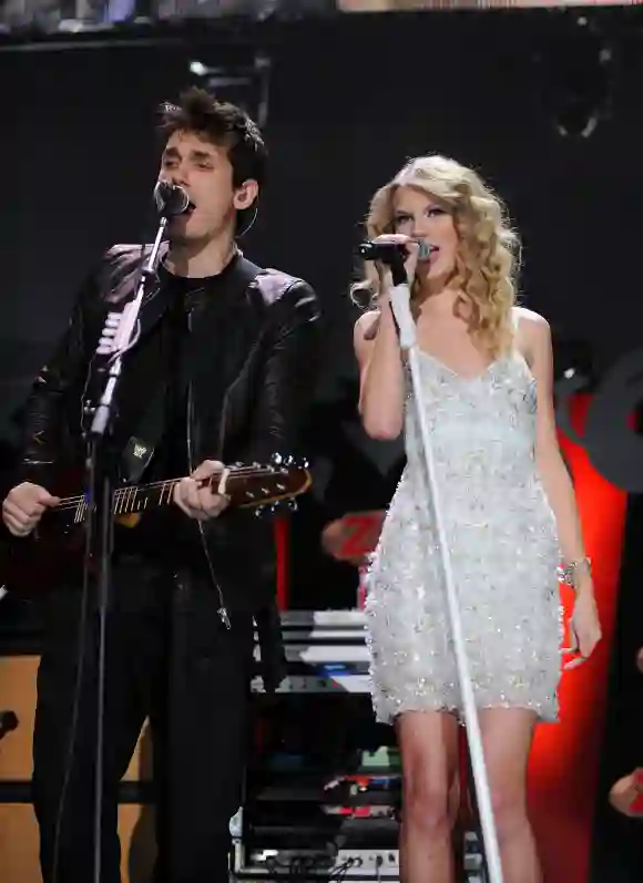 John Mayer and Taylor Swift perform onstage during Z100's Jingle Ball 2009 on December 11, 2009, in New York City.
