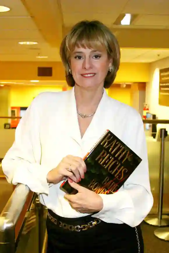 Kathy Reichs signs copies of her book in 2003.