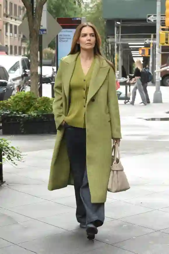 Katie Holmes looks stylish in a matching green coat and top whilst out in New York City Featuring: Katie Holmes Where: N