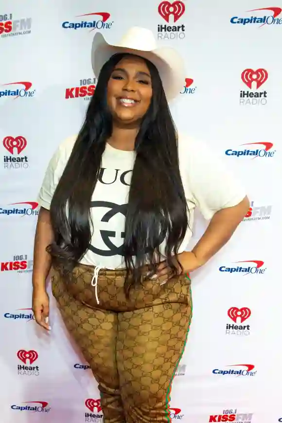 Lizzo poses in the press room at the iHeartRadio 106.1 KISS FM Jingle Ball at Dickies Arena on December 3, 2019 in Fort Worth, Texas