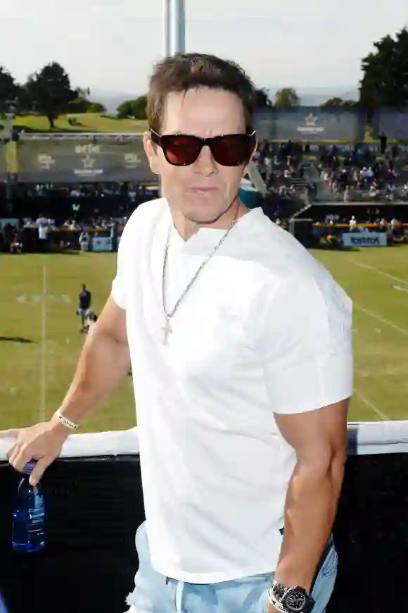 Mark Wahlberg attends The Dallas Cowboys Training Camp to Announce Wahlburgers Opening at The Star in Frisco on August 03, 2019