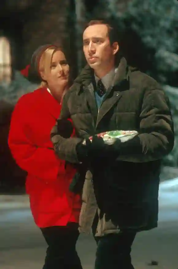 Téa Leoni y Nicolas Cage en una escena de la película 'Hombre de familia' (The Family Man)